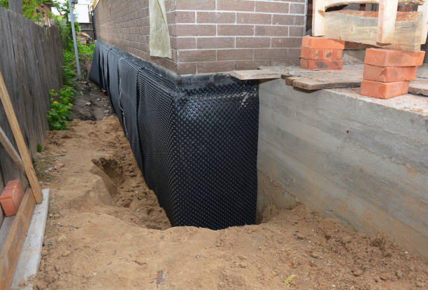 Happy homeowners after waterproofing job in Ashburn